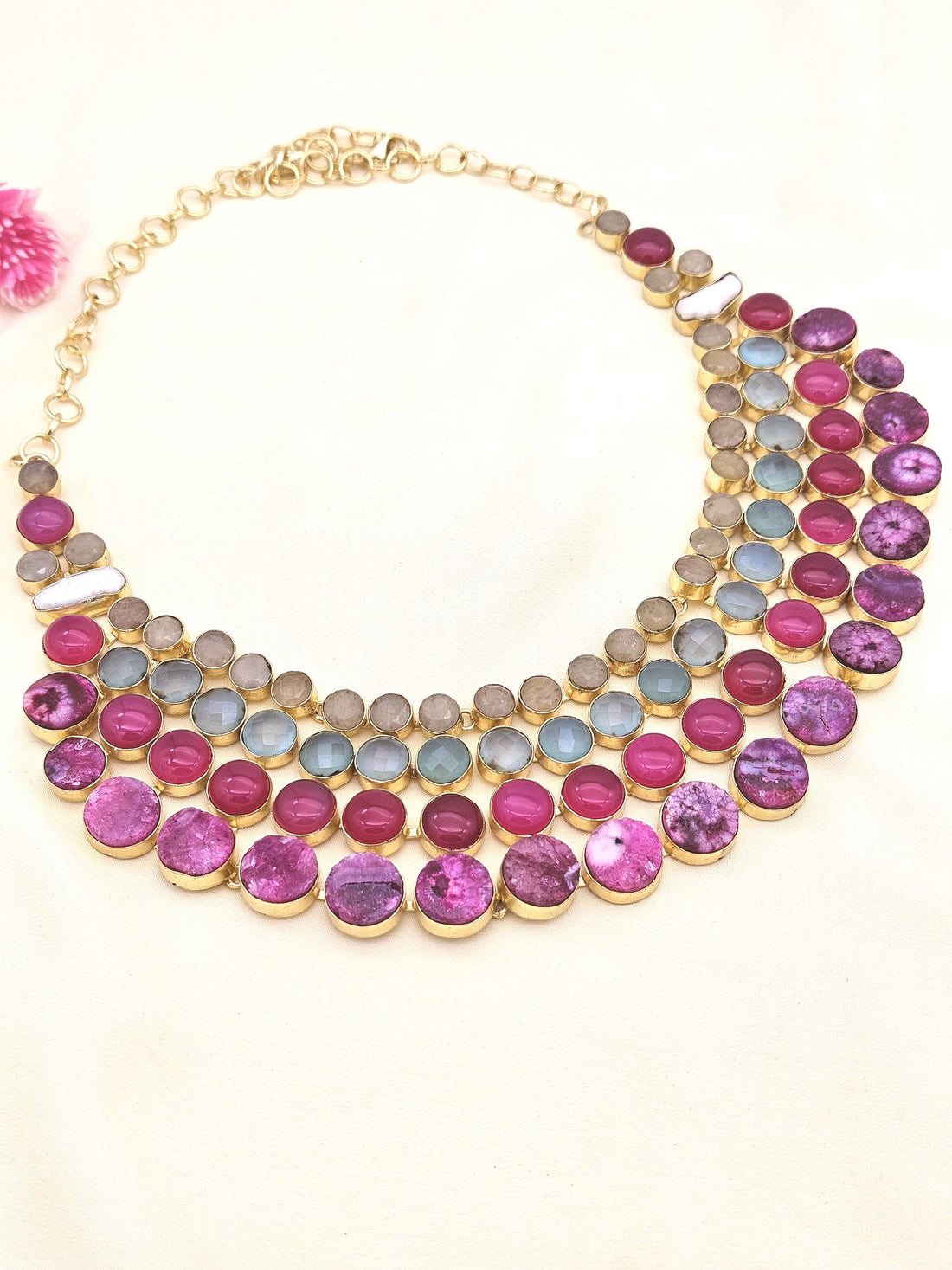 Bold handcrafted statement necklace in antique gold with magenta Onyx, Chalcedony, pearls, and solar quartz
