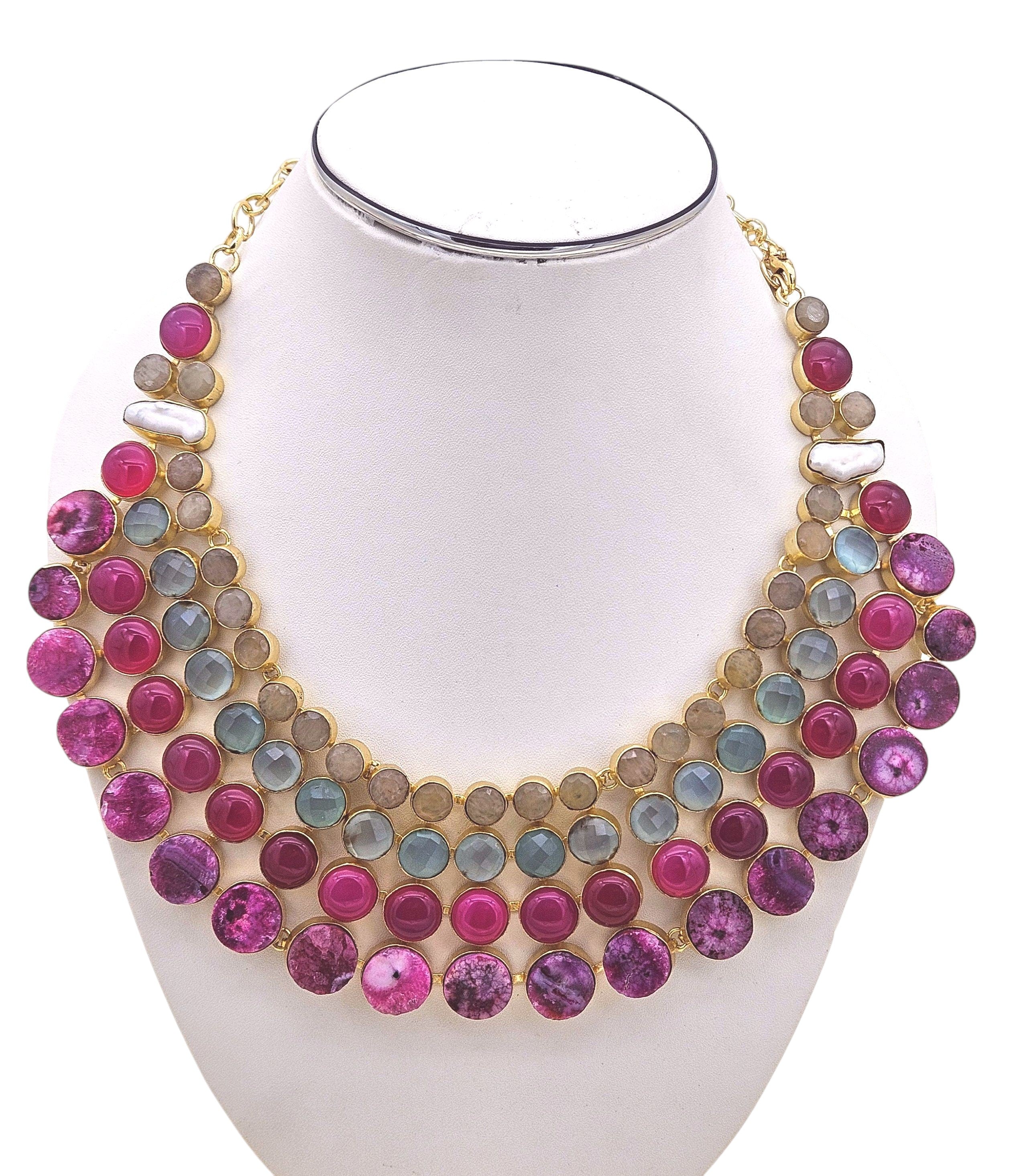  Designer handcrafted necklace with magenta and pink stones, pearls, and solar quartz in antique gold plating"
