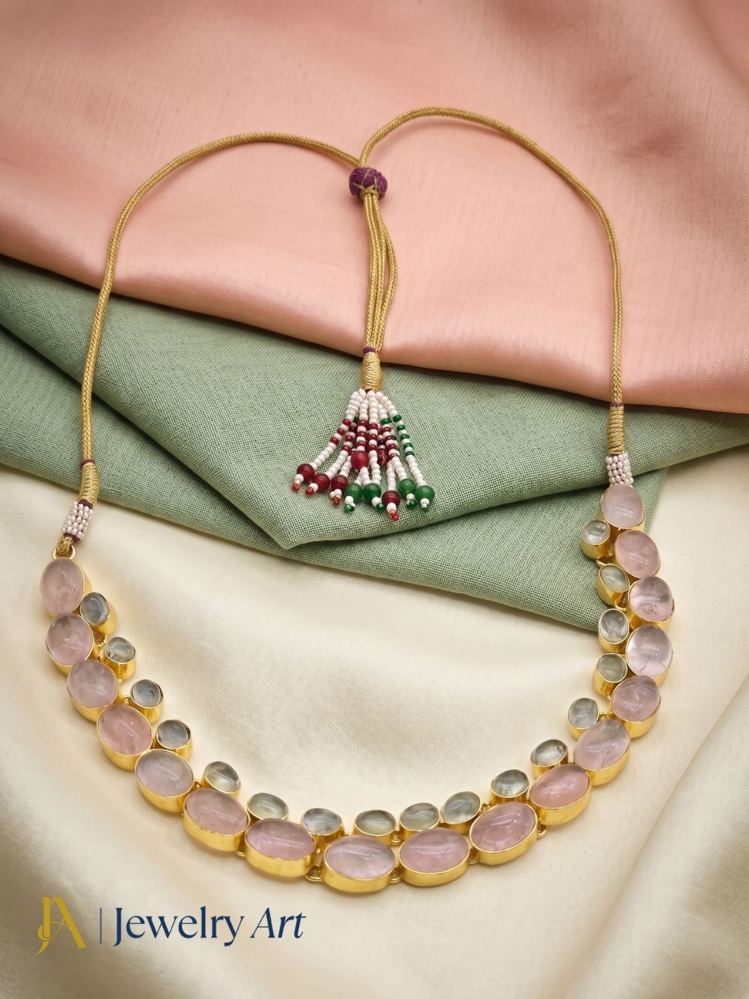 Modern designer gold plated necklace with natural gemstone accents
