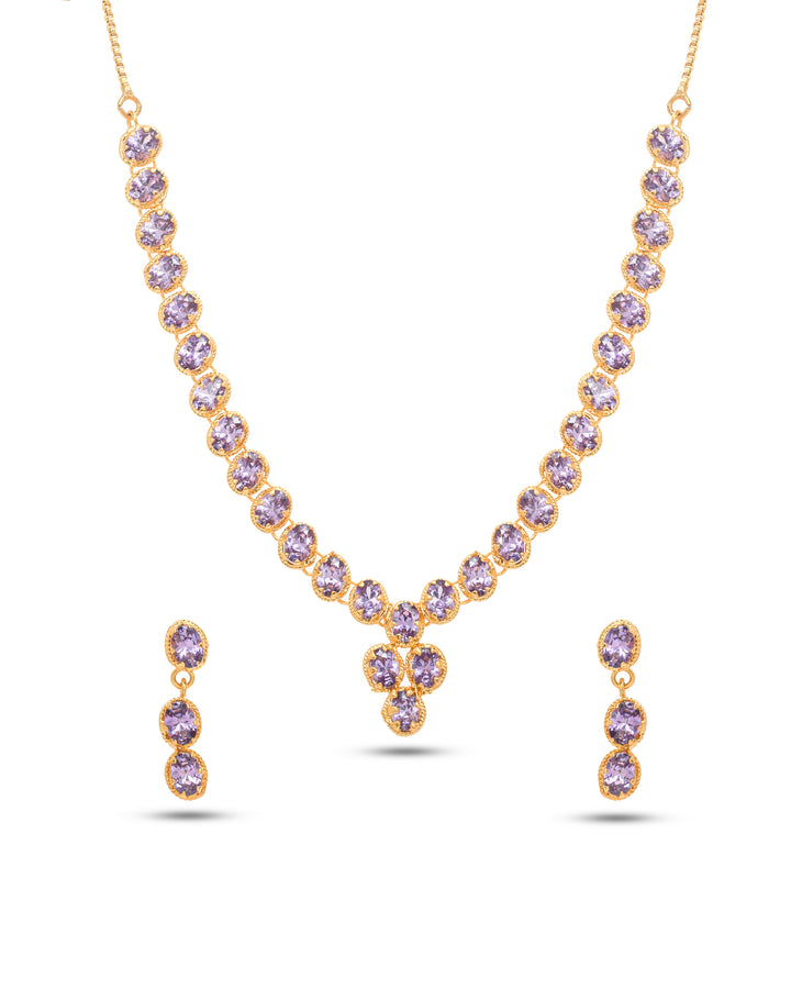 Purple hydro quartz necklace and earrings in antique gold finish, crafted for women’s luxury festive looks
