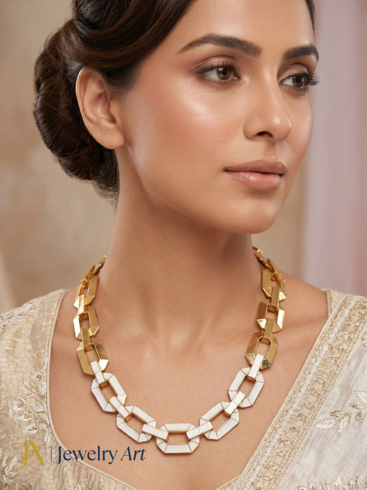 Modern statement necklace with artistic enamel and gold plated detailing
