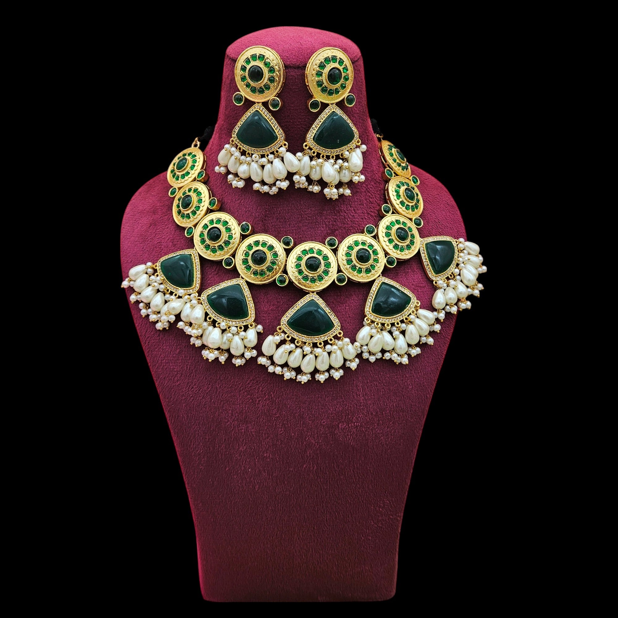Elegant green Monalisa and pearl choker necklace set, beautifully showcased on a neck stand—ideal festive wear for women
