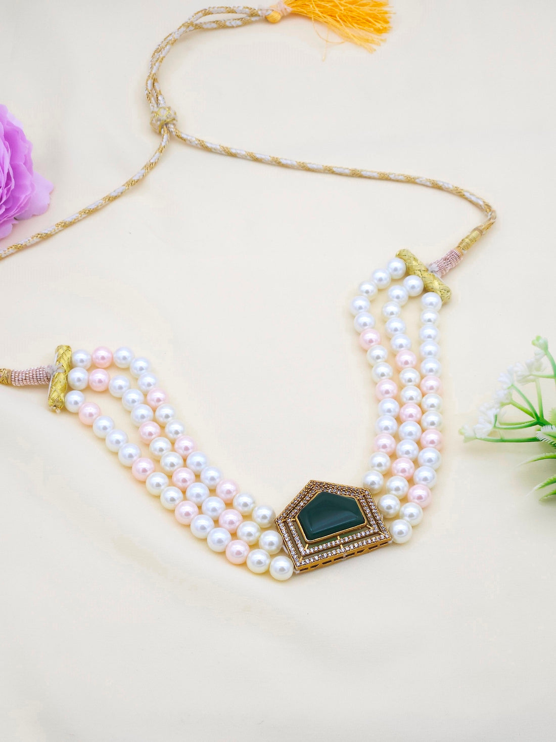 Stunning antique gold plated choker necklace with green glass stone, pearls, and sparkling AD crystals for festive wear
