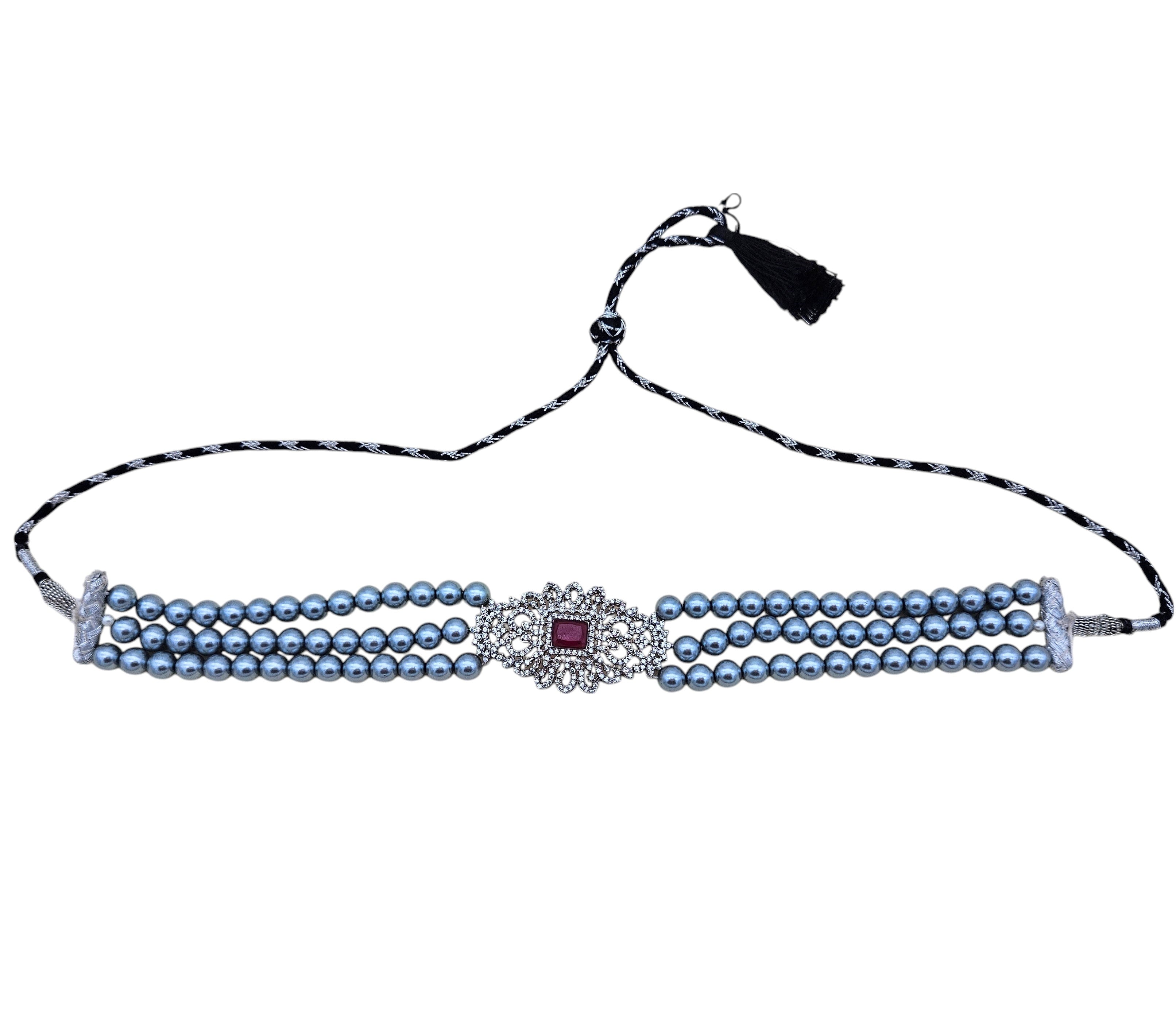 Ornate silver-tone choker necklace with American diamonds, red synthetic gems, and classic pearls – festive wear
