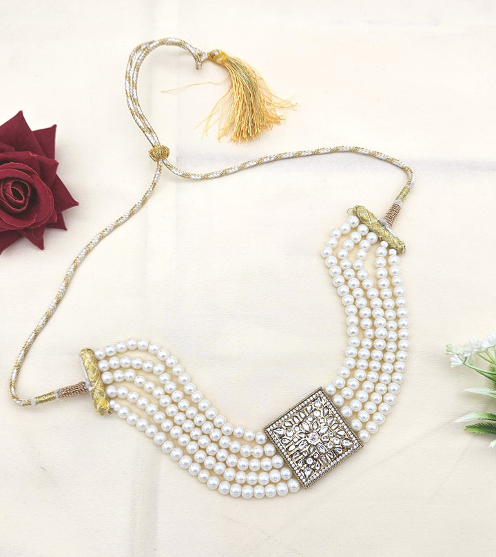 Antique gold choker necklace featuring synthetic Polky, American diamonds, and classic pearl accents
