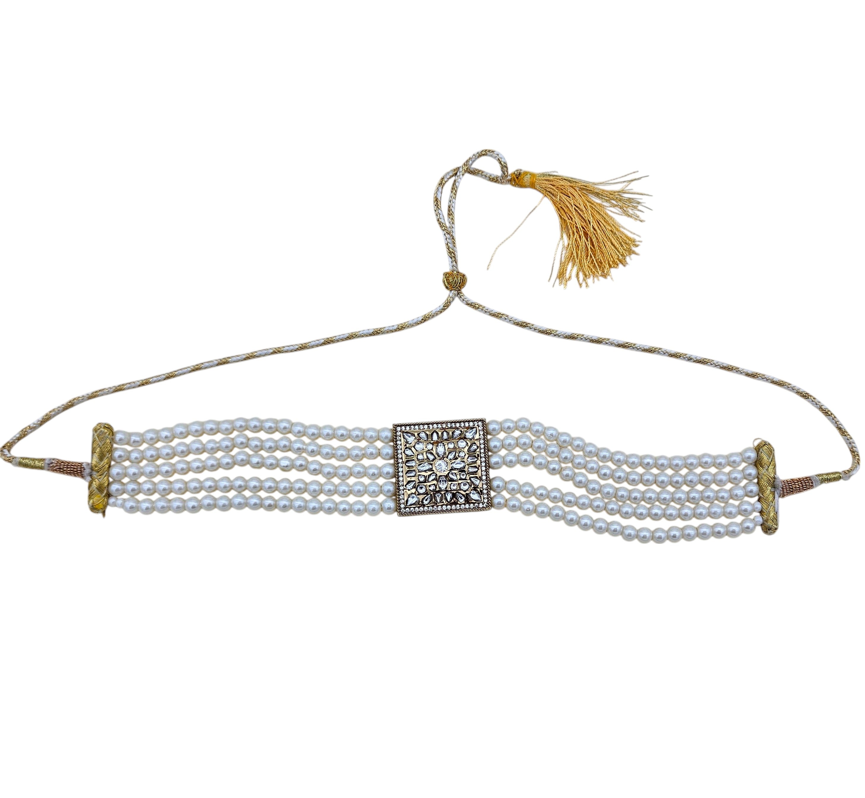 Festive antique gold choker necklace embellished with synthetic Polky, American diamonds and pearls
