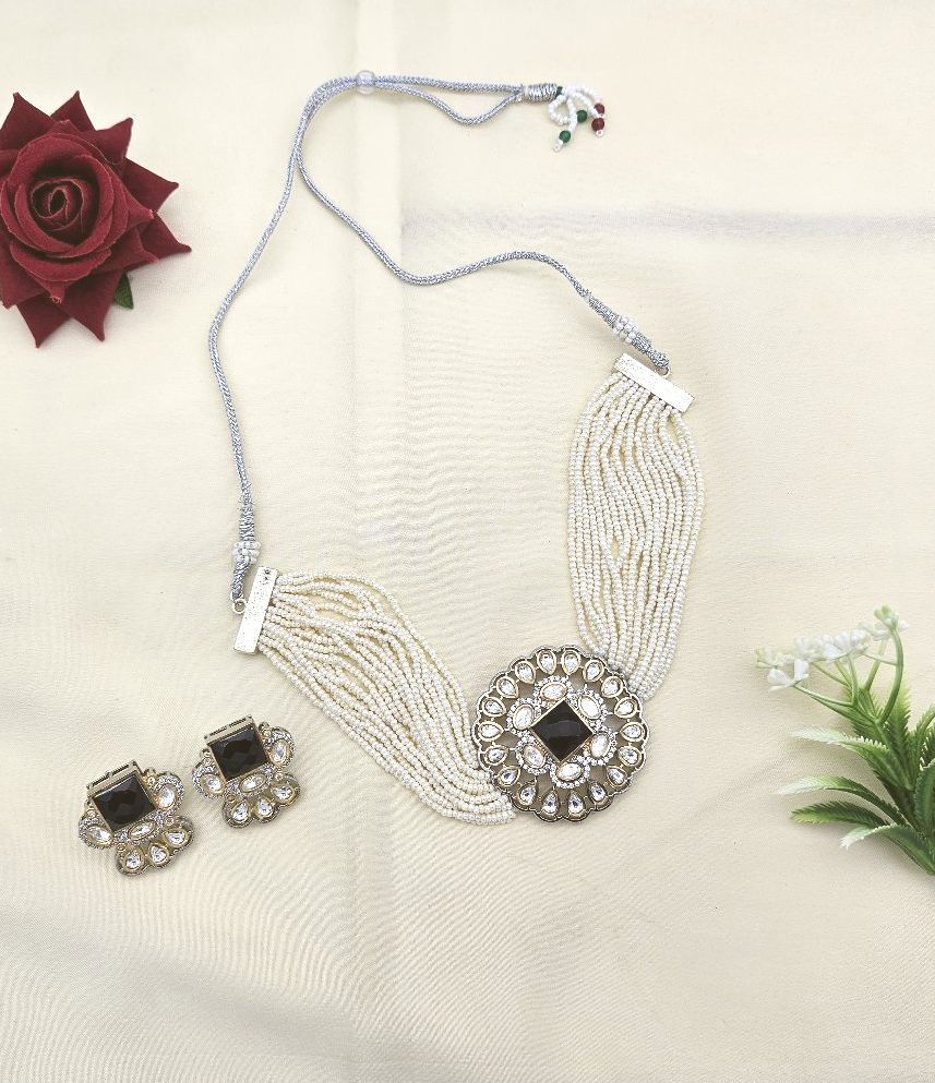 Designer choker set featuring synthetic Polky, American diamonds, pearls, and sparkling glass stones

