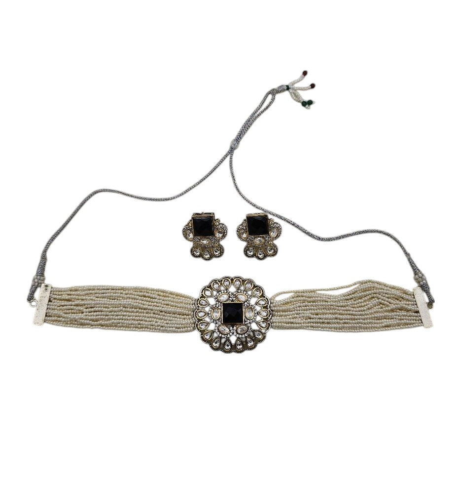 Luxury choker and earrings with synthetic Polky work, pearls, dazzling AD stones, and glass accents – perfect for weddings or parties
