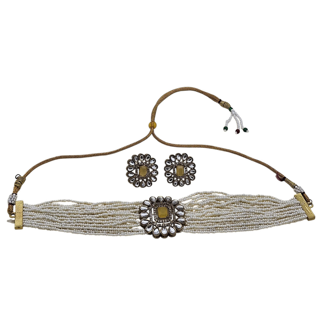 Intricate gold-tone choker set featuring Monalisa stones, synthetic Polki, American diamonds, and elegant pearls
