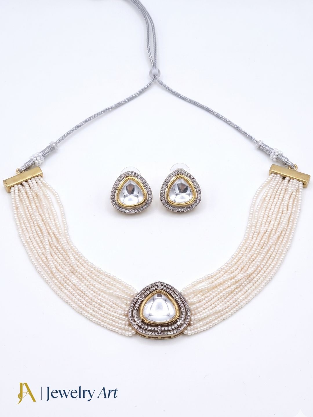 Statement antique gold choker set with pearl accents and elegant earrings
