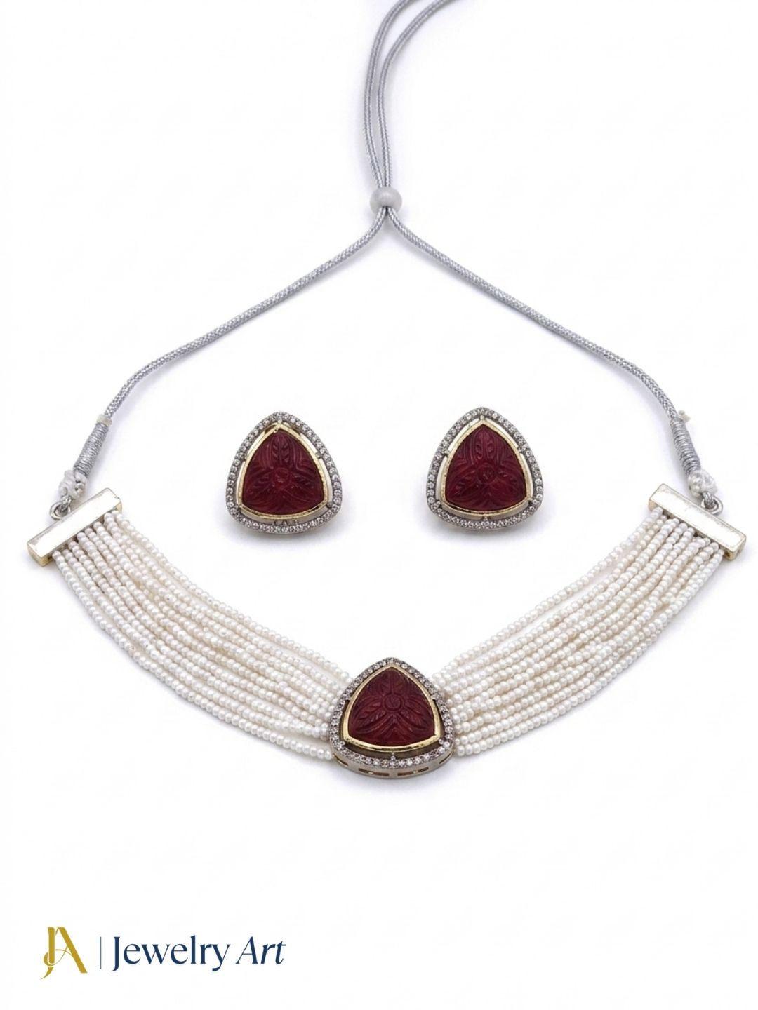 Gold plated necklace set with AD stones pearls and red carving glass work
