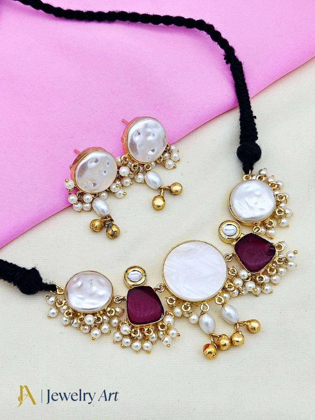 Stylish antique gold choker jewelry set with red stone designer detailing
