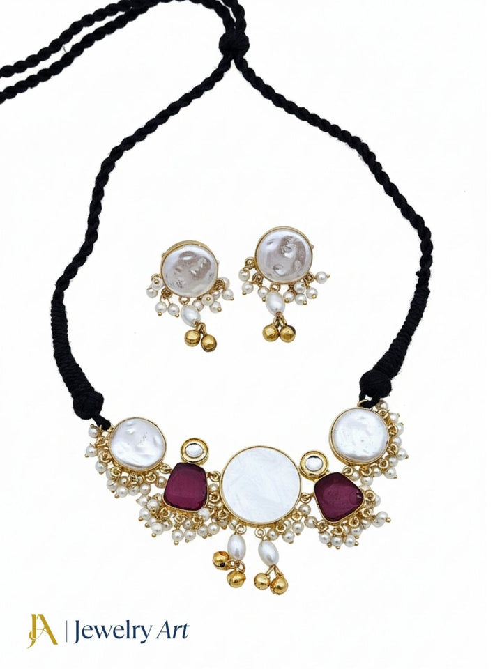 Stylish antique gold choker jewelry set with red stone designer detailing
