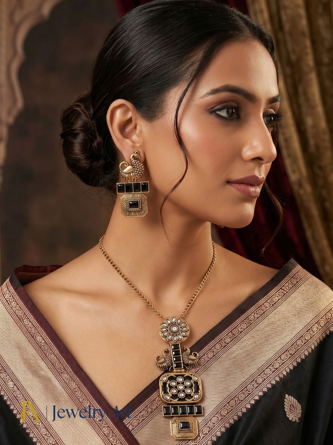 Designer antique gold statement necklace earrings set with black glass stone detailing
