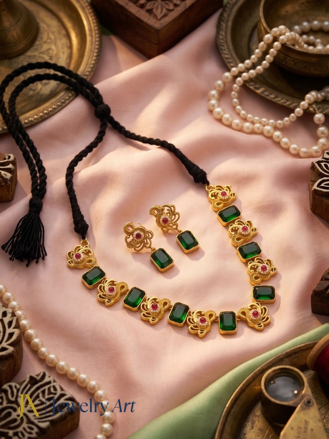Stylish antique gold plated ethnic jewelry set with green glass stones and red glass bead embellishments
