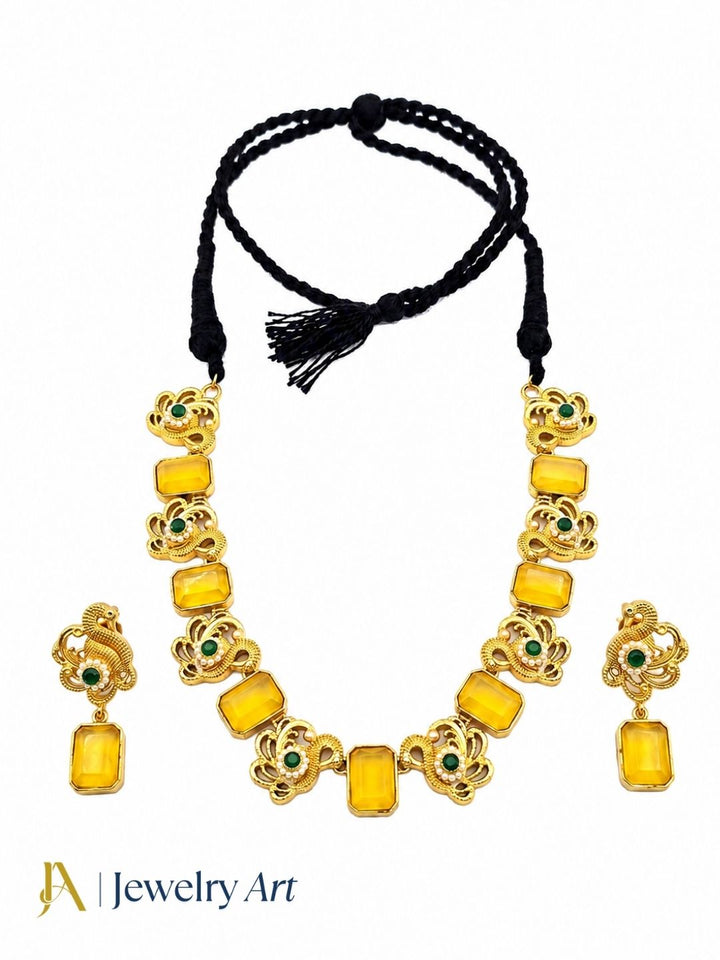 Premium handcrafted necklace earrings set with yellow glass stones 
