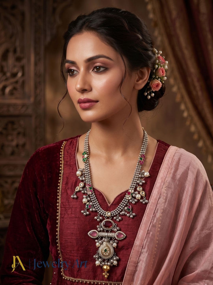 Luxury silver oxidized long necklace with faux kundan polky, red glass stones, pink Monalisa stones, and pearl detailing
