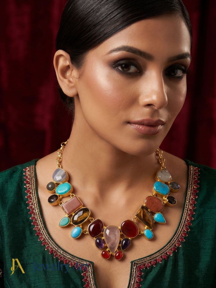 Premium gold plated ethnic statement necklace with vibrant semi precious stone accents

