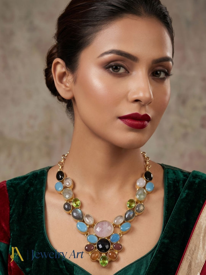 Artistic gold plated statement necklace with vibrant semi precious stones
