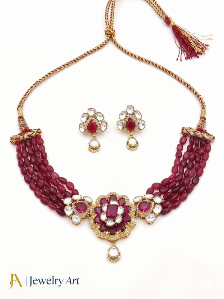 Designer broad choker necklace earrings set with red hydro quartz detailing
