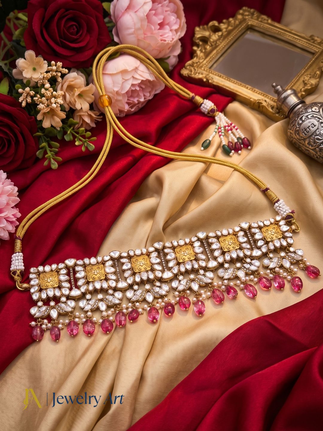 Designer gold plated necklace with red hydro quartz and synthetic polky detailing
