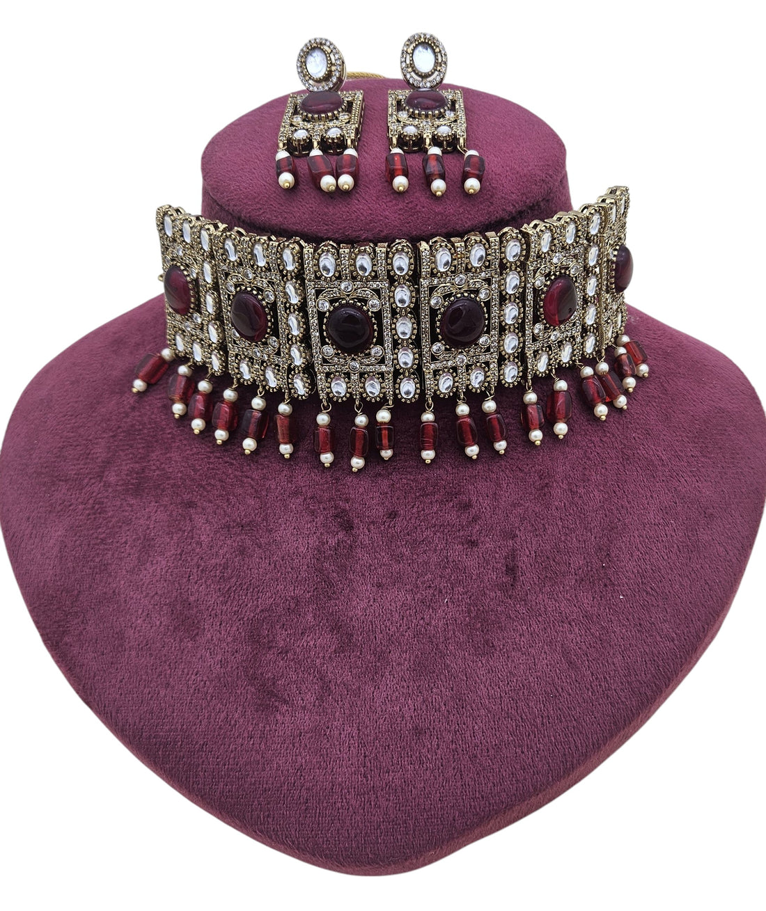 Detailed close-up of antique finish gold choker set showcasing ornate patterns and fine craftsmanship – perfect for party wear
