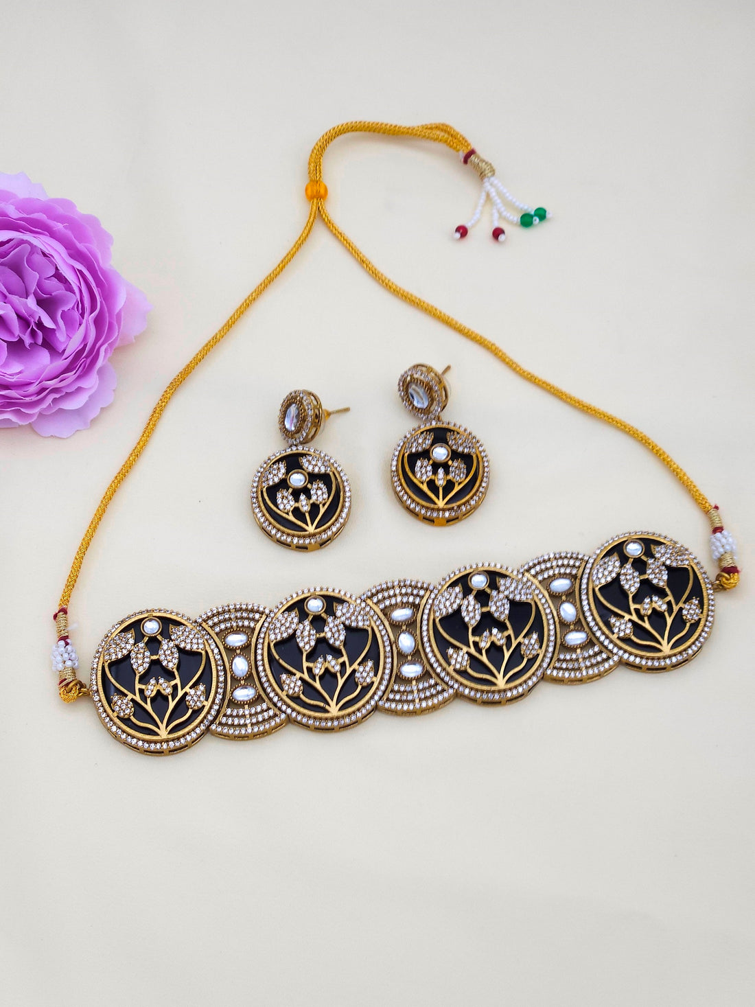 Women’s party wear antique gold choker necklace and earring set with charming designer craftsmanship
