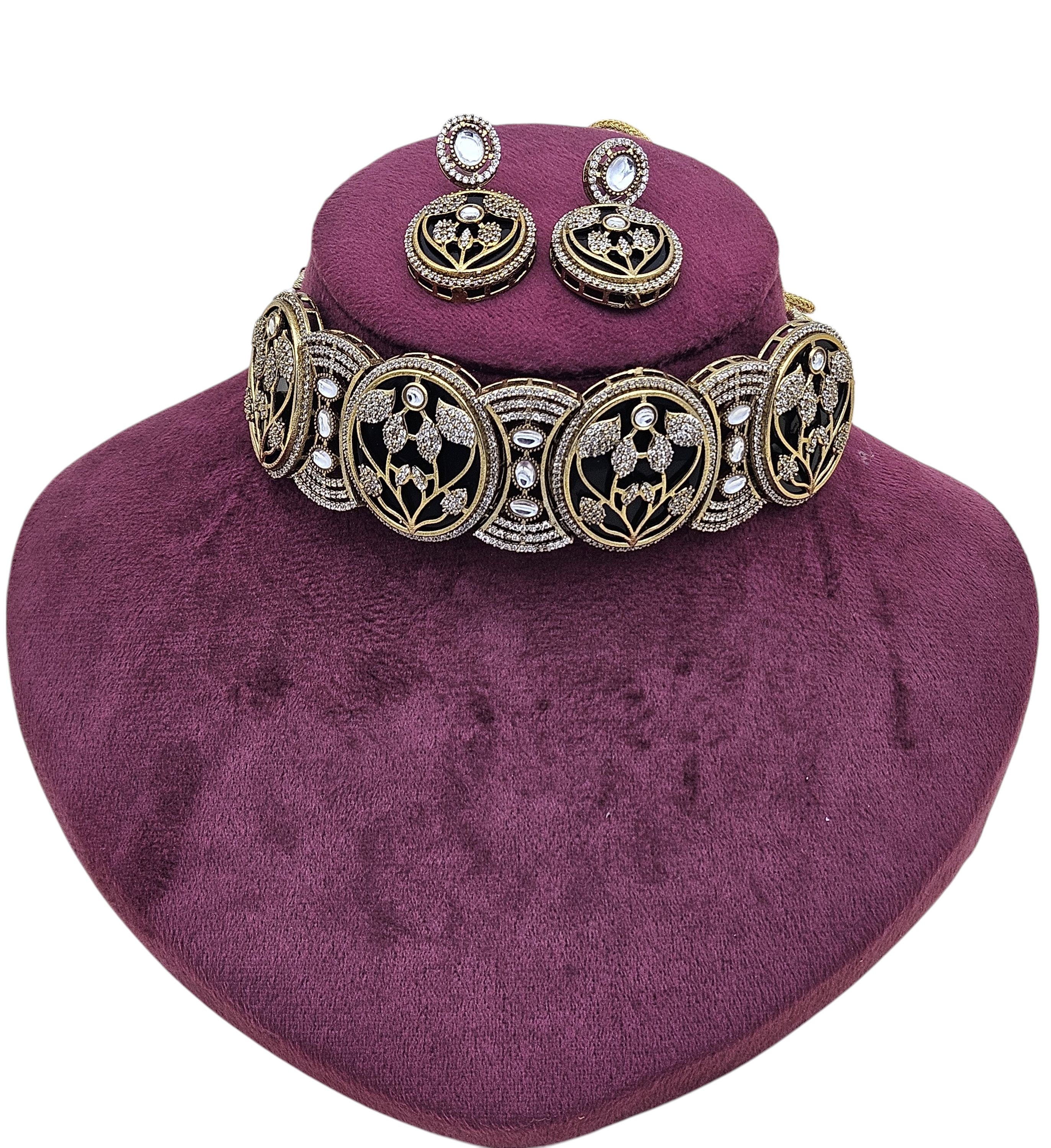 Elegant antique gold choker and earring set for women, featuring intricate designer detailing for party looks
