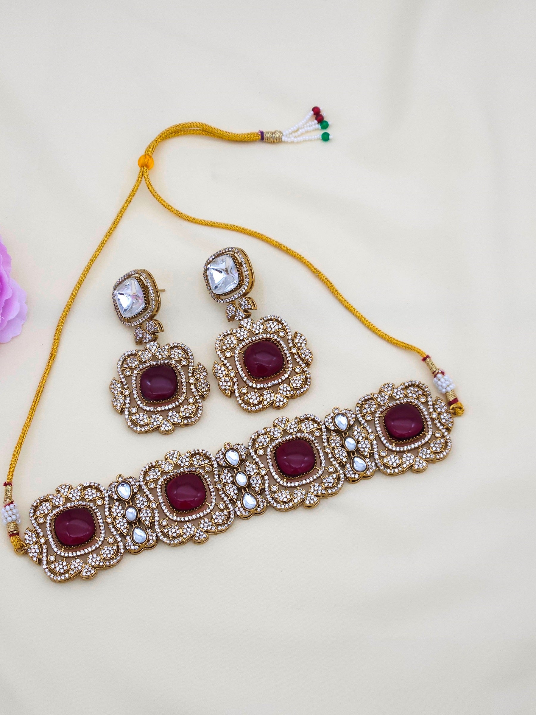 Stylish antique gold choker and earring set for women, perfect for party wear and festive occasions
