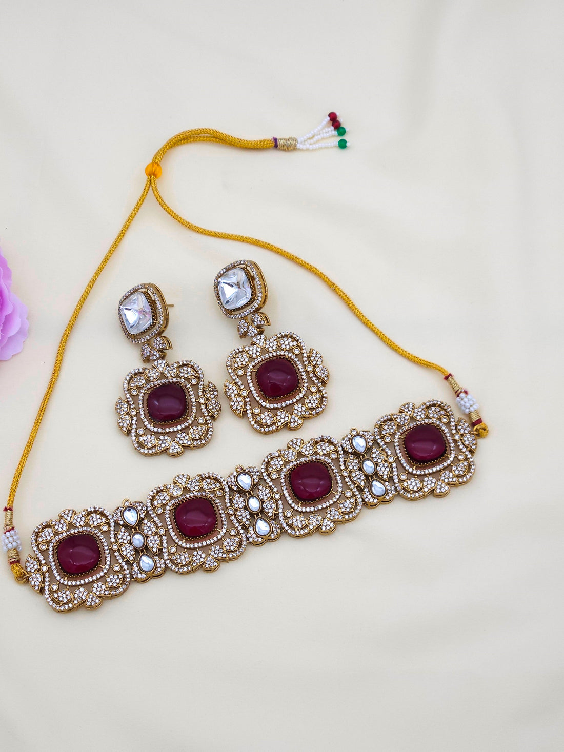 Stylish antique gold choker and earring set for women, perfect for party wear and festive occasions
