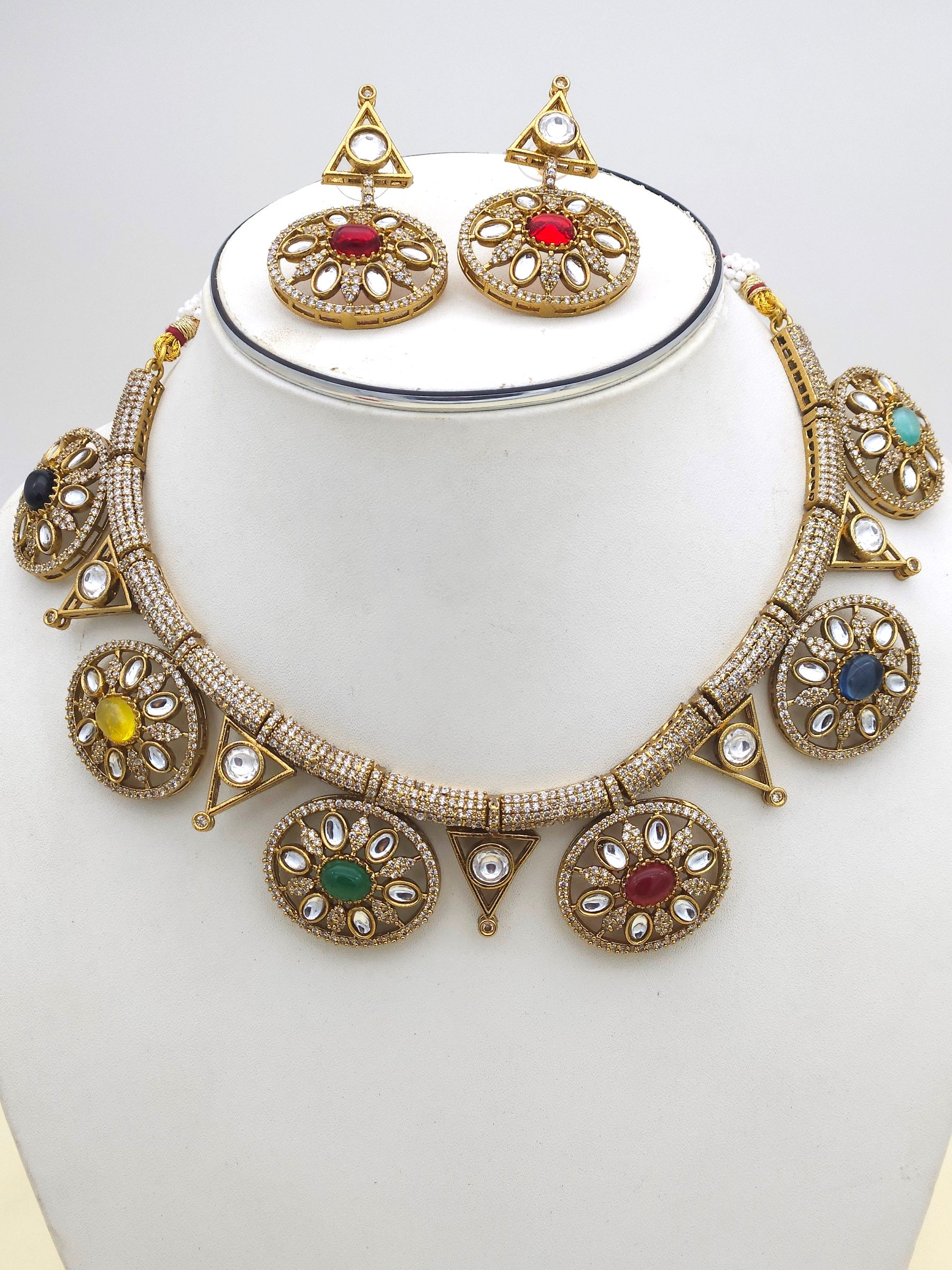 Detailed view of antique gold jewelry set showcasing intricate Polky and American diamond craftsmanship
