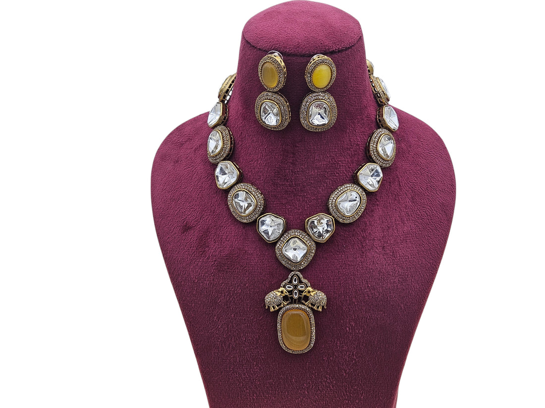 Macro shot capturing the fine craftsmanship of Polky and American diamonds on antique gold-plated jewelry
