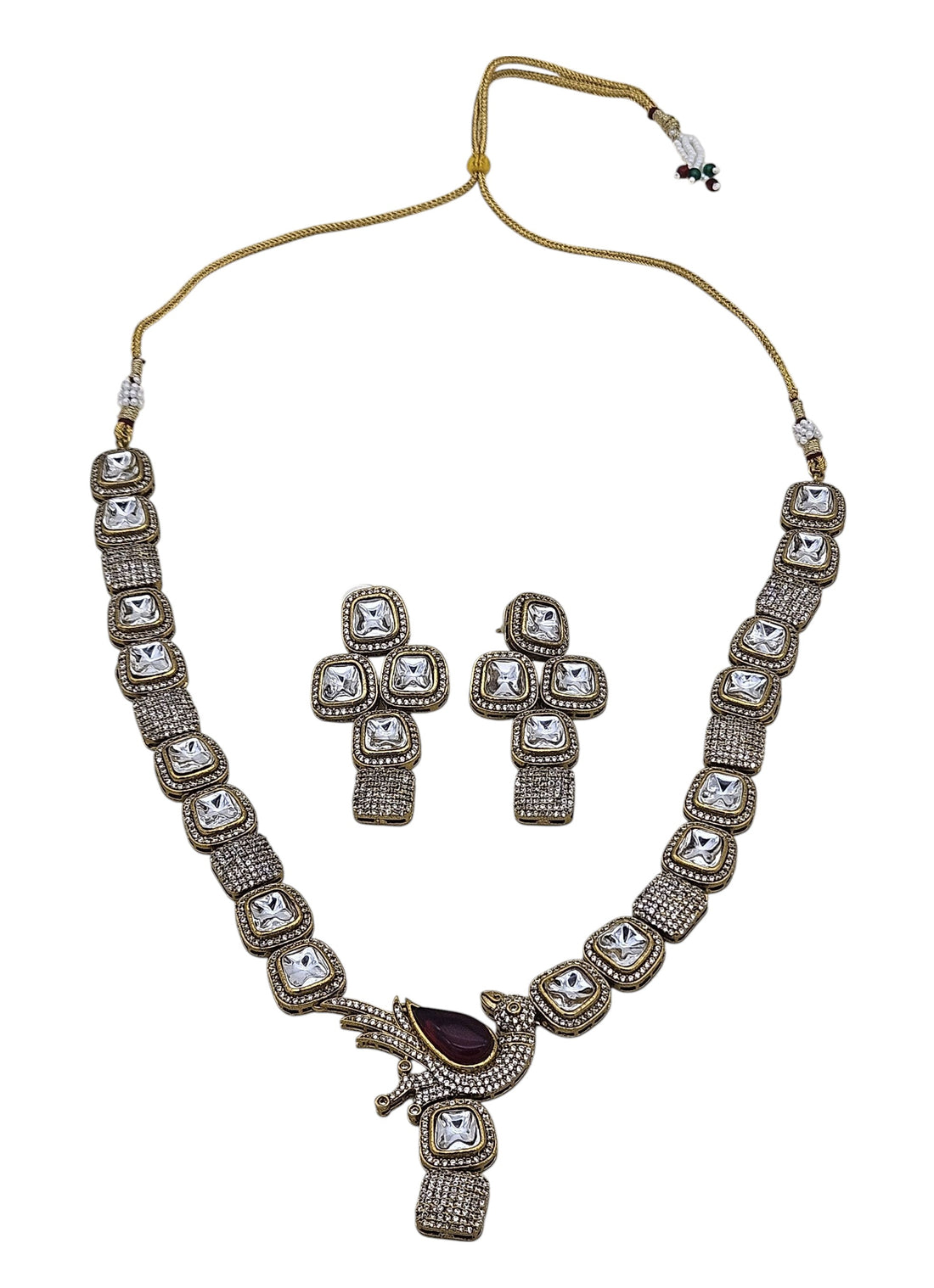 Designer gold-plated Polky AD necklace with matching earrings, ideal for ethnic celebrations and bridal events
