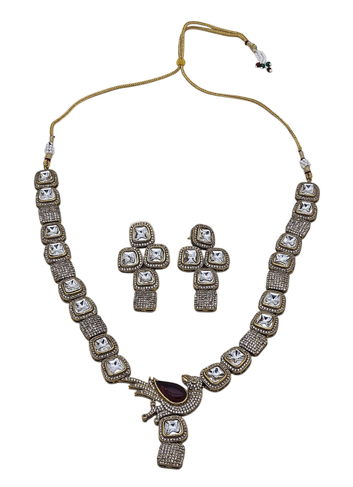 Designer gold-plated Polky AD necklace with matching earrings, ideal for ethnic celebrations and bridal events
