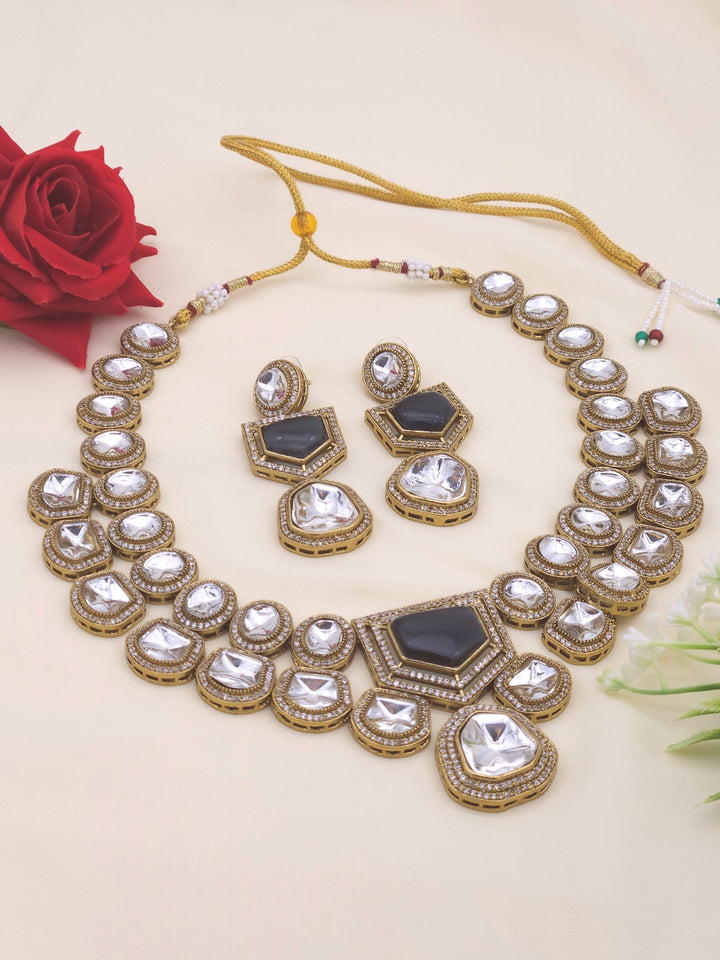 Charming antique gold finish AD and Polky necklace–earring set for festive and bridal wear
