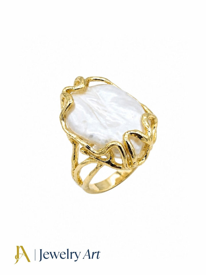 Stunning gold plated Baroque Pearl handcrafted designer ring for women, artistic statement jewelry isolated on a pure white background for premium eCommerce photography.
