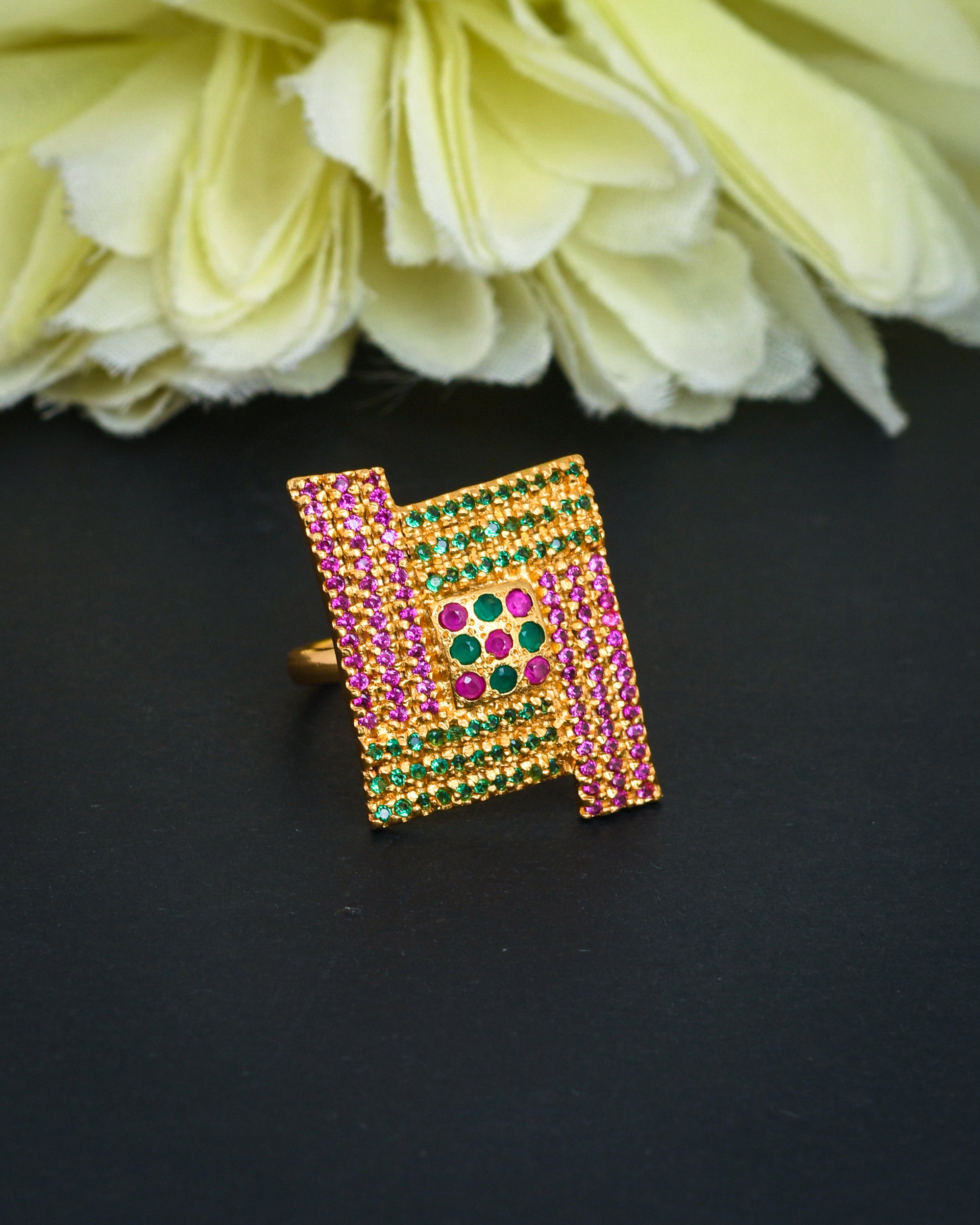 Luxury antique gold finger ring with artistic designer charm, blending heritage beauty with modern fashion
