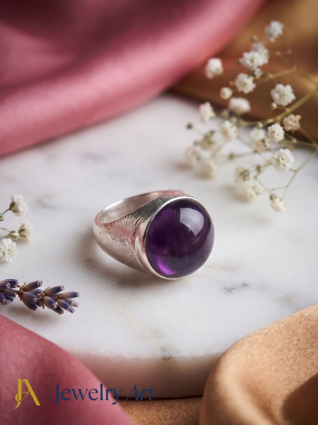 Handcrafted natural Amethyst gemstone ring for men in silver plated GS displayed in a luxury decorative jewelry setup with elegant props, highlighting the natural gemstone and artisan craftsmanship.
