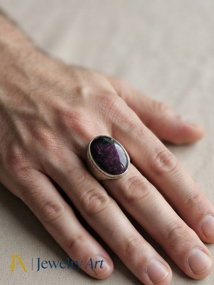 Fashion model showcasing a natural Ruby Zoisite gemstone handmade silver plated GS designer statement ring.
