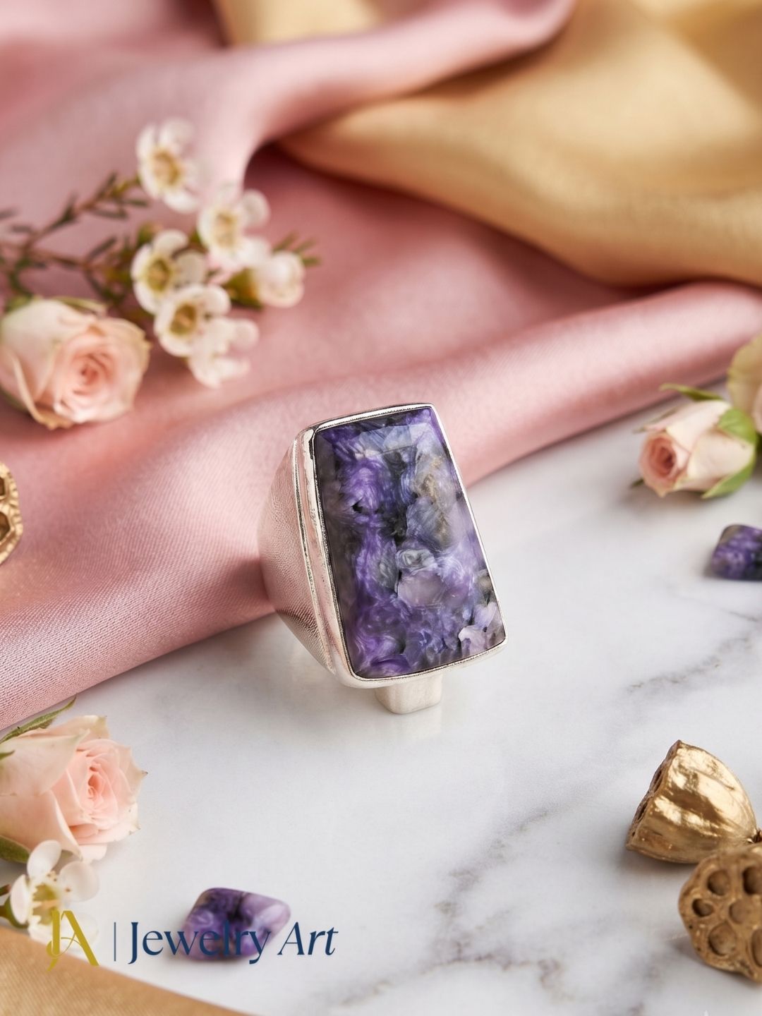 Luxury jewelry photography featuring Charoite men's ring
