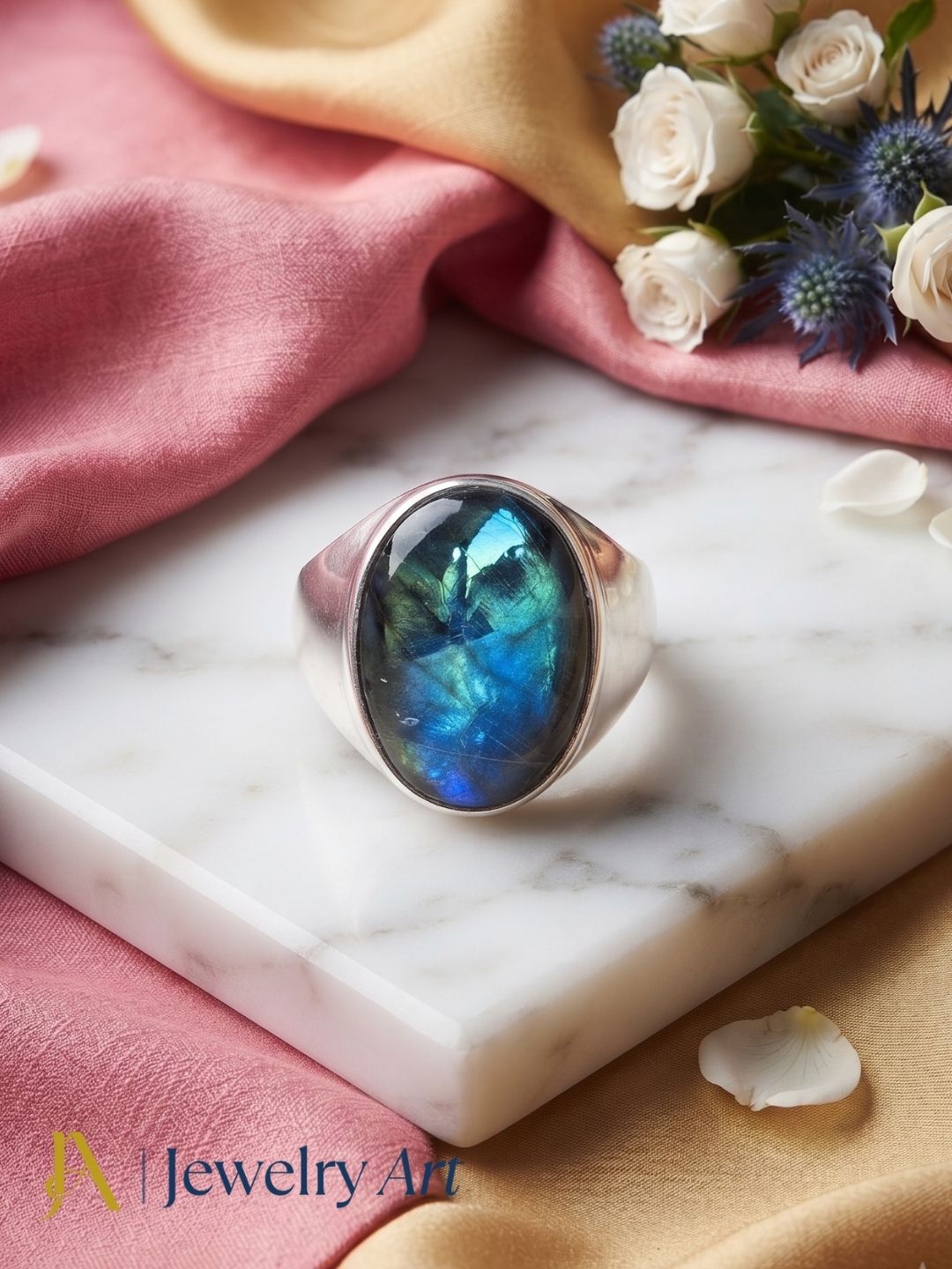 Luxury flat lay featuring a handmade Labradorite gemstone designer ring for men with elegant presentation.
