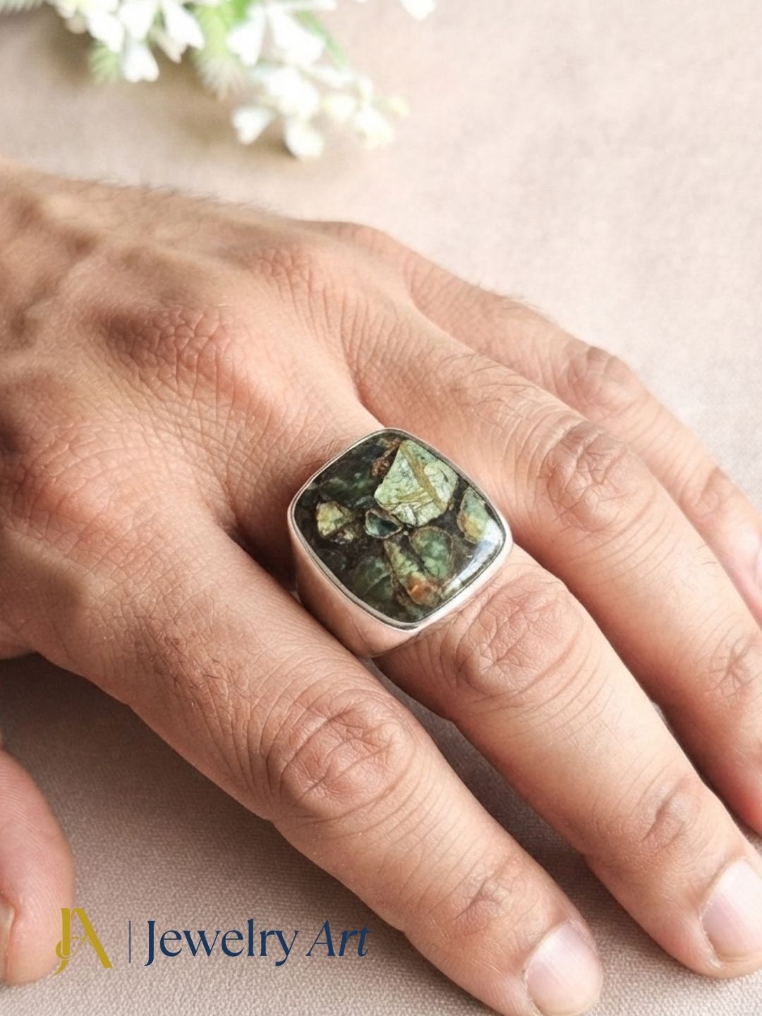 Male model wearing a handmade natural Copper Chrysocola gemstone silver plated GS designer ring with modern men's fashion styling.
