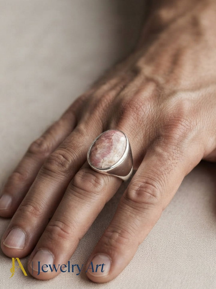 Handcrafted Jasper gemstone designer ring showcased on a male model with luxury contemporary styling.
