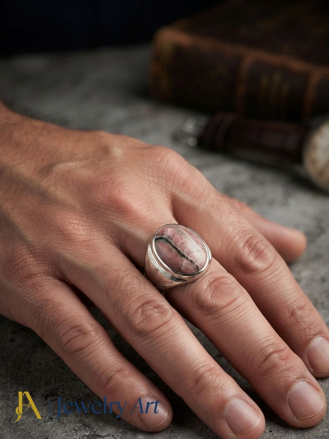 Fashion model showcasing a natural Jasper gemstone handcrafted silver plated GS designer statement ring with a contemporary look.
