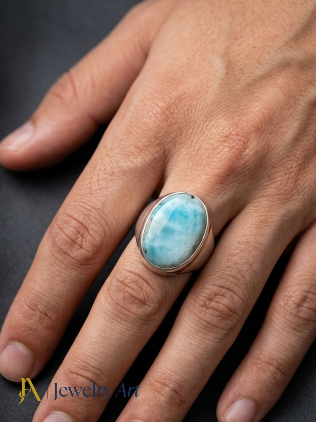 Stylish man wearing premium Natural Copper Larimar silver plated ring
