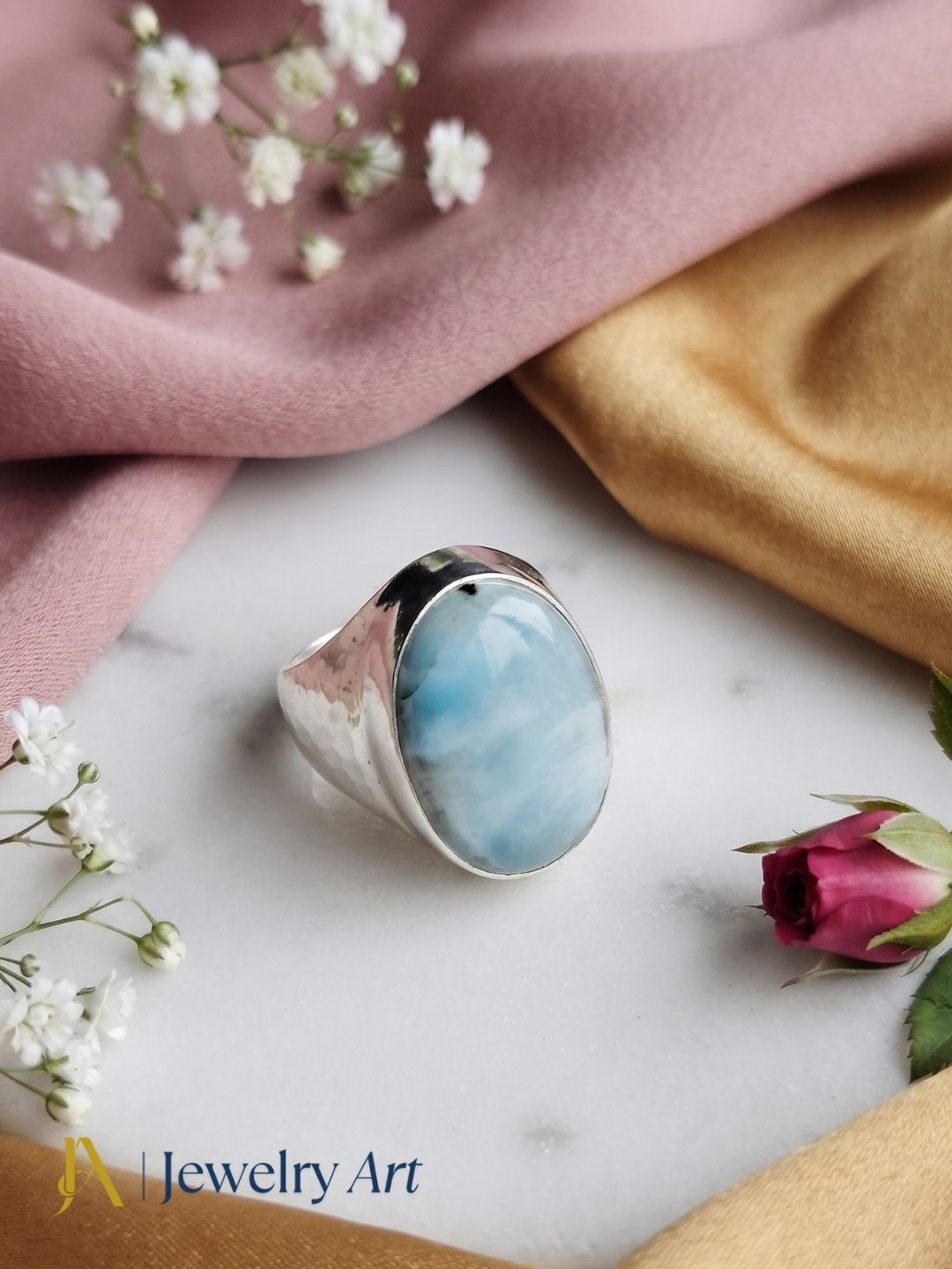 Stylish man wearing premium Natural Copper Larimar silver plated ring

