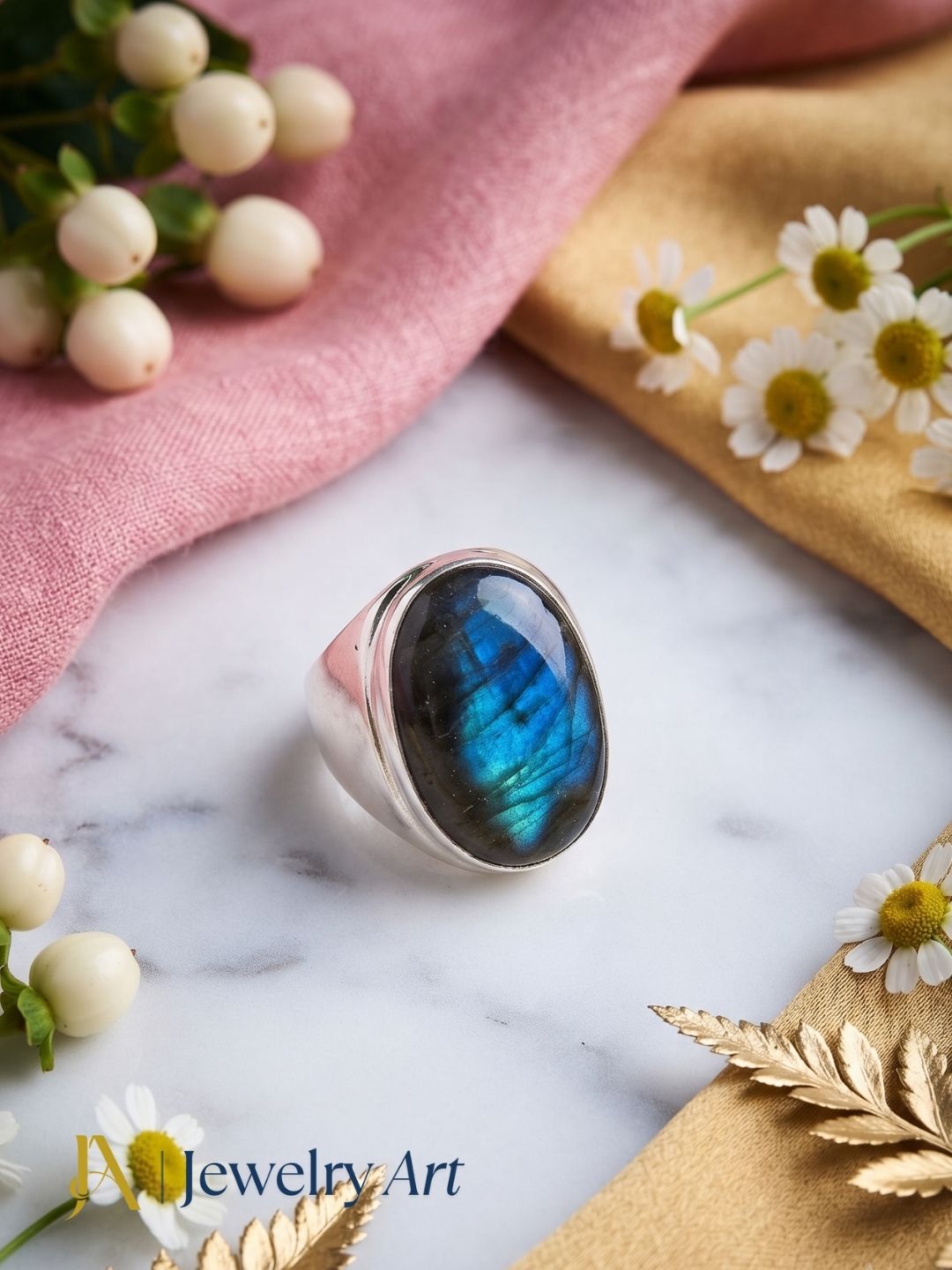 Natural Labradorite gemstone ring in silver plated GS displayed in a refined decorative jewelry arrangement with premium styling.
