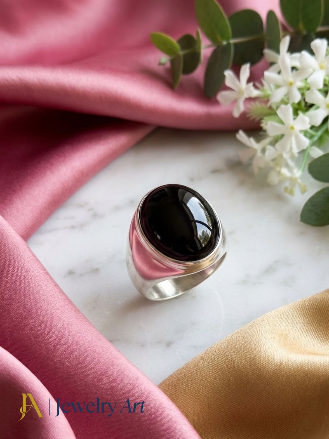 Decorative setup highlighting Black Onyx designer men's ring
