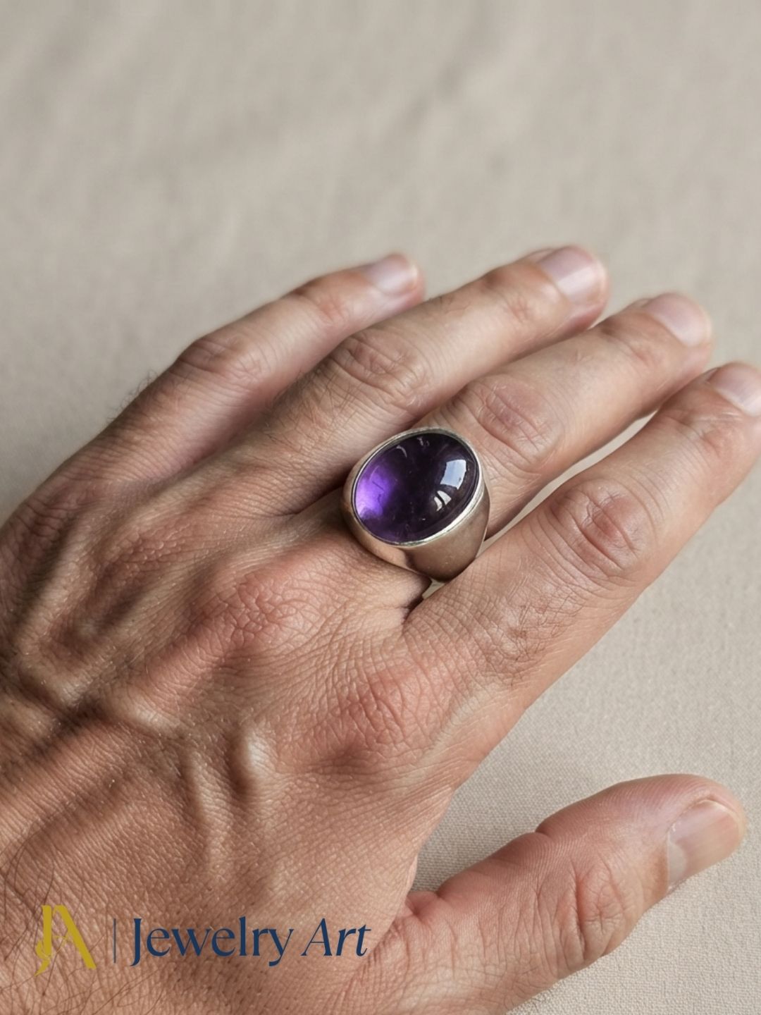 Male model wearing an artisan Amethyst gemstone silver plated GS designer statement ring, showcasing premium handcrafted craftsmanship with modern men's fashion styling.
