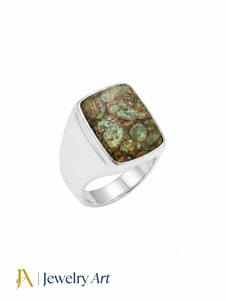 Elegant natural Copper Chrysocola stone men's ring with a handmade silver plated GS setting, professionally photographed on a pure white background.
